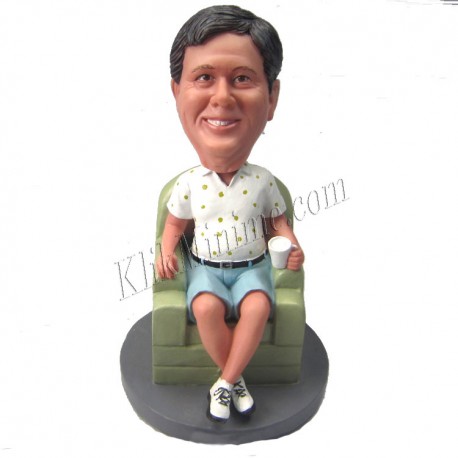 Patung Official Boss On Sofa